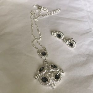 Silver-tone necklace-earring set. Gray gems 16”